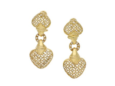 Aretes calados con colgantes y diamantes motivo corazón en oro amarillo 18 kilates. Discount