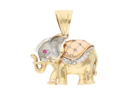 Dije diseño especial motivo elefante con sintéticos en oro tres tonos 14 kilates. Online now