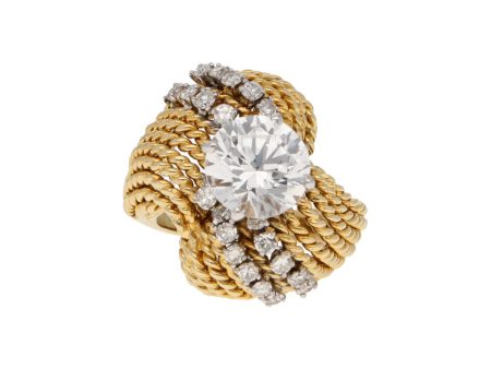 Anillo tenzado con diamantes y circonia en oro amarillo 18 kilates. For Discount