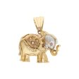 Dije diseño especial motivo elefante con sintéticos en oro tres tonos 14 kilates. Online now